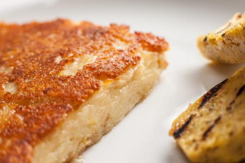 a close up of a piece of food on a plate at Agriturismo I Comelli in Nimis