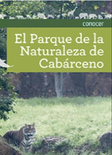 a book with a tiger sitting in the grass at Hotel Cantabrico in Liérganes
