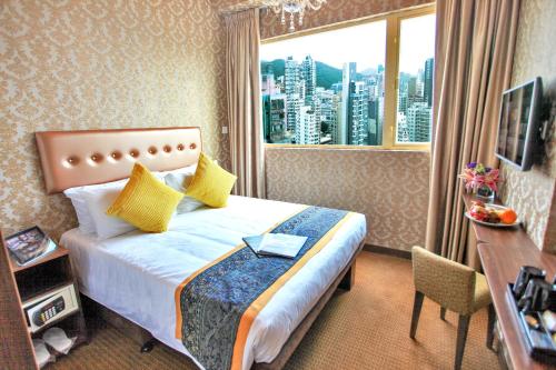 Cama o camas de una habitación en Grand City Hotel