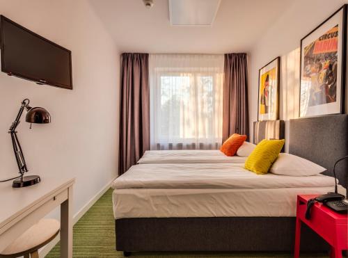 Postel nebo postele na pokoji v ubytování B&B Julinek Park