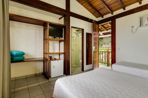 Katil atau katil-katil dalam bilik di Hotel Coquille