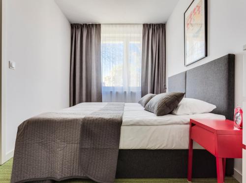 Postel nebo postele na pokoji v ubytování B&B Julinek Park