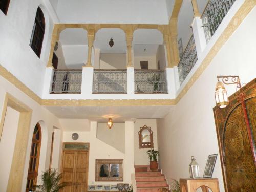 a staircase in a home with white walls and ceilings at dar wassim el ghali in Rabat