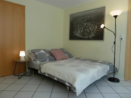 Ferienwohnung Baumann tesisinde bir odada yatak veya yataklar