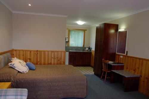 Ένα ή περισσότερα κρεβάτια σε δωμάτιο στο Kentish Hills Retreat