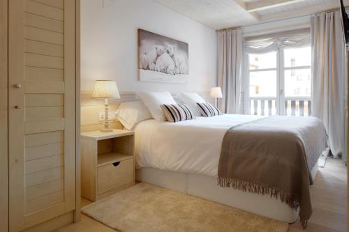 Voodi või voodid majutusasutuse Val de Ruda Luxe 51 by FeelFree Rentals toas