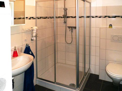 a bathroom with a shower and a sink at Ferienwohnung Anke - Apartment 3c in Heinsberg