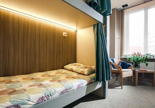 Giường trong phòng chung tại Hostel Sleep Space