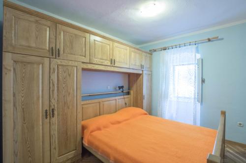 Posteľ alebo postele v izbe v ubytovaní Apartman juričić