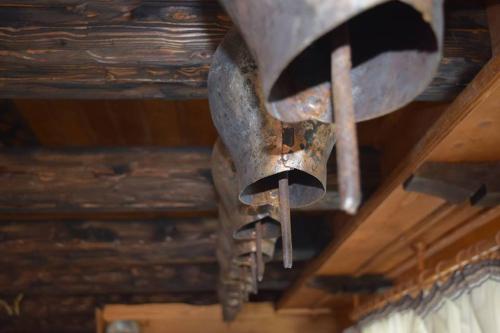 a large metal object hanging from a ceiling at Guest Rooms Profirov in Zlatograd