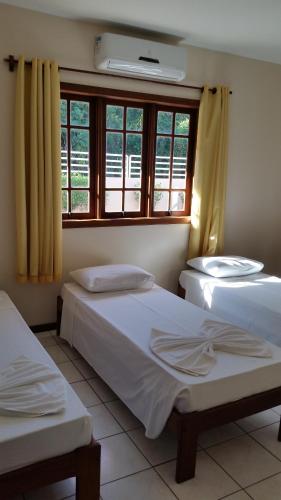 Katil atau katil-katil dalam bilik di Mestre Lord Apart Hotel