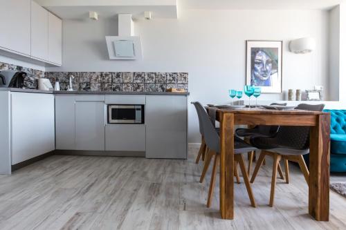 Kuchyňa alebo kuchynka v ubytovaní Apartament Świętokrzyska