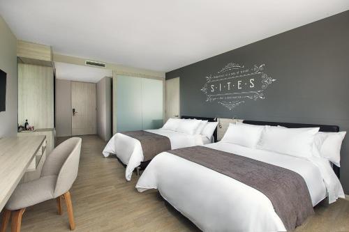 Un ou plusieurs lits dans un hébergement de l'établissement Hotel Sites Montería