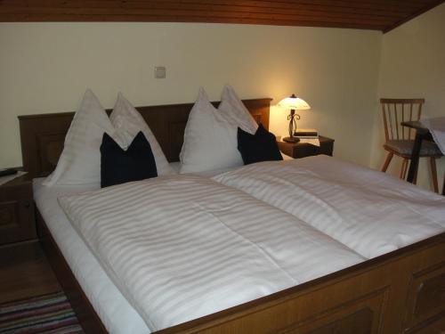 Cama o camas de una habitación en Ferienwohnung Haus Lehen