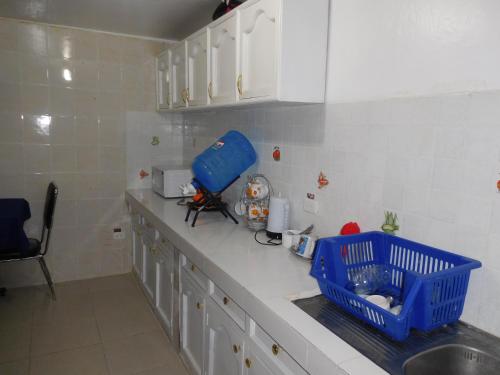 Kuchyň nebo kuchyňský kout v ubytování Hostal Alborada Riobamba