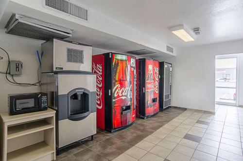 a room with cocacola pepsi soda machines at Motel 6-Rock Springs, WY in Rock Springs