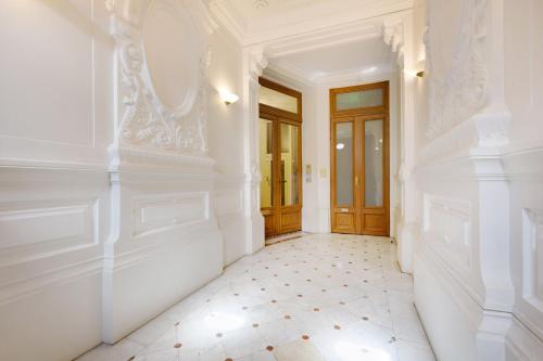Ένα ή περισσότερα κρεβάτια σε δωμάτιο στο Haussmann 168