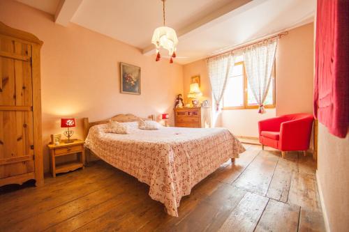 Llit o llits en una habitació de La ferme du Château