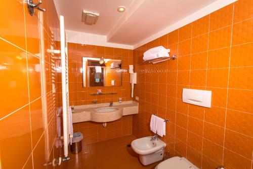 Koupelna v ubytování City Hotel
