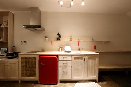 مطبخ أو مطبخ صغير في Muju House
