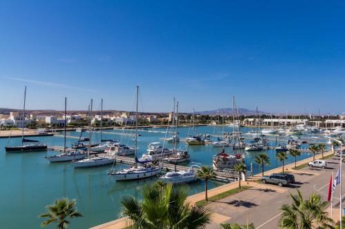 a bunch of boats docked in a harbor at Chez Younès Appartement Marina Saidia Ap8 in Saidia 