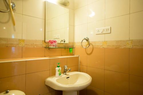 Ванна кімната в Eclat Suites MINT Gomti Nagar