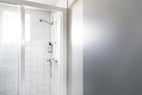 Kylpyhuone majoituspaikassa Hotel Höfn