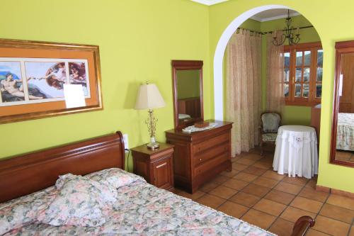 Ліжко або ліжка в номері Chalet Apartamento Manolo