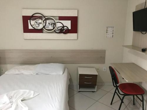 Ένα ή περισσότερα κρεβάτια σε δωμάτιο στο Hotel Milla