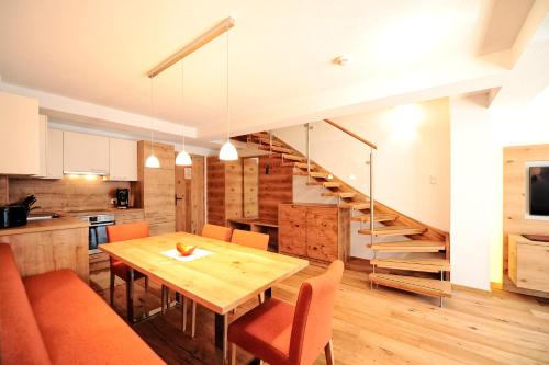 Kuchyň nebo kuchyňský kout v ubytování Hotel Dorfstadl