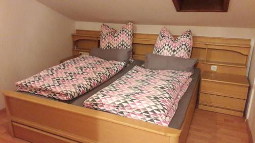two beds sitting next to each other in a room at Alpina Inzell 108 - Chiemgau in Inzell