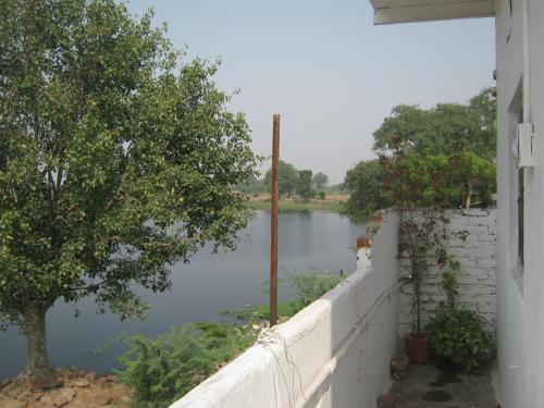 a view of a river from a white wall at Friends in Khajuraho in Khajurāho