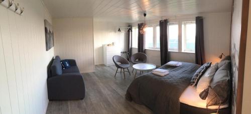 Photo de la galerie de l'établissement Lofoten Bed & Breakfast Reine - Rooms & Apartments, à Reine