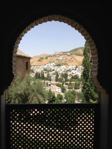 a view of a city from a window at Cuevas Helena in Benamaurel