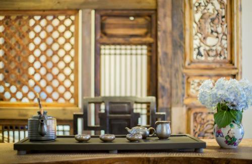 Φωτογραφία από το άλμπουμ του Old Story Inn Lijiang Old Town σε Λιγιάνγκ