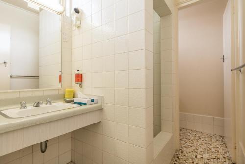 Ванная комната в Bendigo Oval Motel