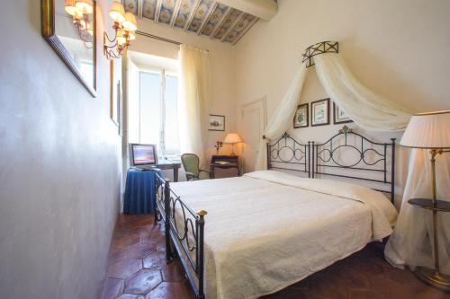 Katil atau katil-katil dalam bilik di Hotel Villa Ottone