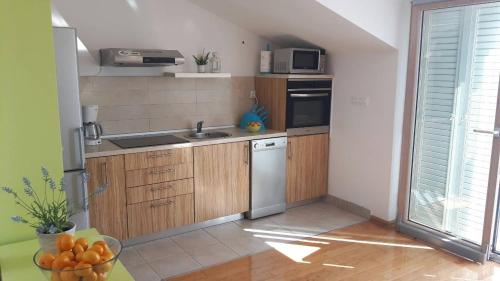 Η κουζίνα ή μικρή κουζίνα στο Apartmani Kali