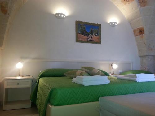 Posteľ alebo postele v izbe v ubytovaní B&B Demetra