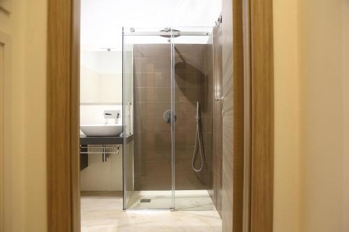 Et badeværelse på Appartamenti Maniace