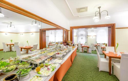 a buffet table with many different types of food at Hotel Hetman in Warsaw