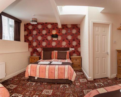 Кровать или кровати в номере The Trafford Hotel