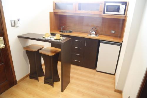 Kuchyň nebo kuchyňský kout v ubytování Hotel Corregidor