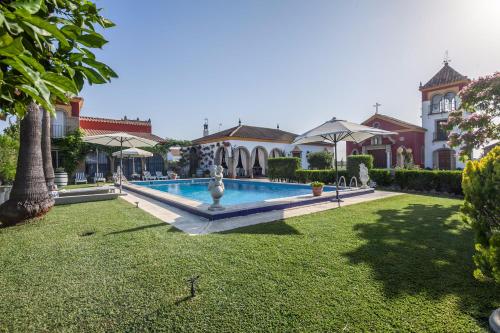 Foto Casa de Campo con Piscina en Sevilla en los Palacios y Villafranca 4