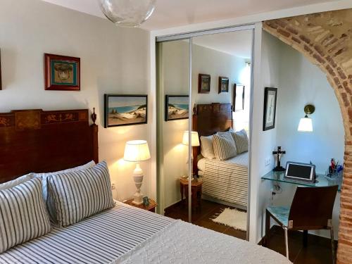 Posteľ alebo postele v izbe v ubytovaní Apartamento con Terraza,a 100m playa Costilla y Frente al Castillo