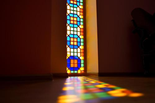 an image of a stained glass window in a room at Yaffle Inn Shaki Boutique Hotel in Sheki
