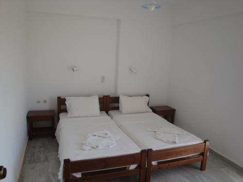 Ένα ή περισσότερα κρεβάτια σε δωμάτιο στο Calamon Apartments