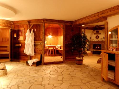 Ένα ή περισσότερα κρεβάτια σε δωμάτιο στο Dolomites Apartments Ciasa Vally