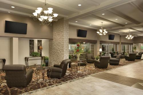Area soggiorno di Radisson Hotel Louisville North