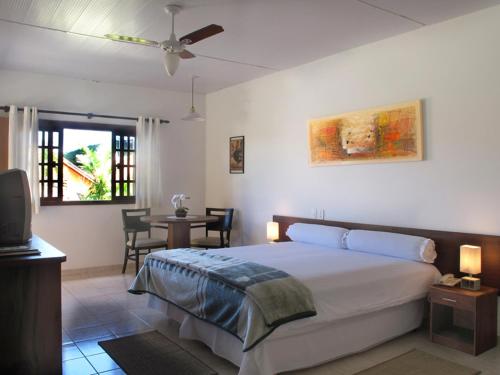 
Cama ou camas em um quarto em Resort Monte das Oliveiras
